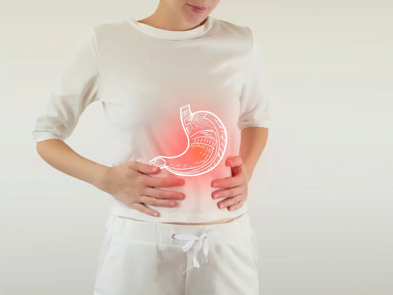 Digital composite of highlighted stomach of woman